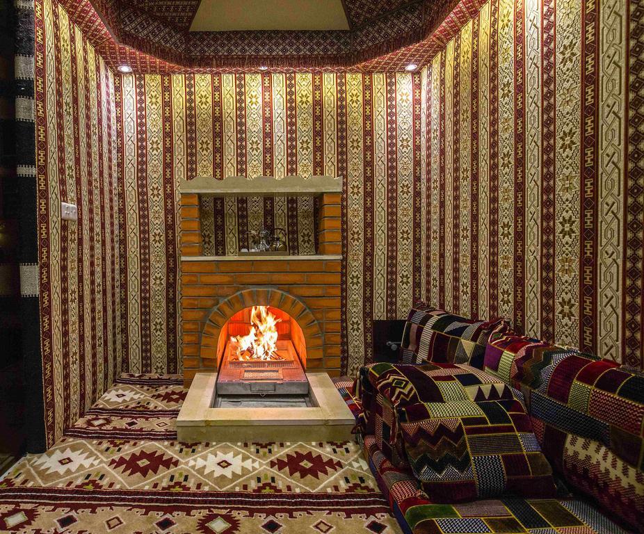 ריאד Rest Night Serviced Apartments- Alhamra מראה חיצוני תמונה A majlis with a fireplace